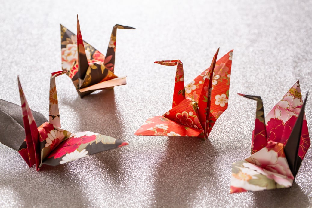 Origami crane, Japanese style background.